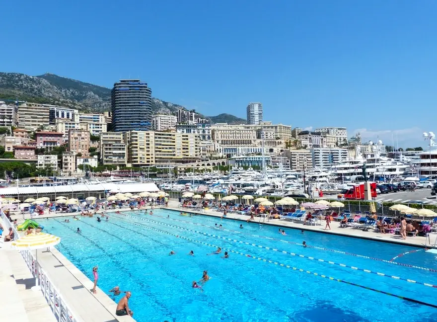 A large outdoor lap pool by the sea