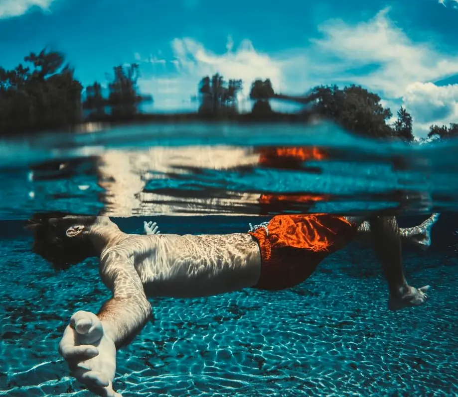 A swimmer gliding beneath the surface